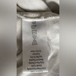 Karyn Seo Drs Divya
Camouflage High Low
Embroidered Drees
Sz L Size L Photo 5