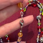 Double strand green silver red purple yellow different size beads necklace EUC Photo 3