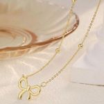 Bow Necklace Gold Photo 0
