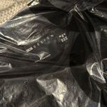 ASOS  DESIGN crochet long sleeve tie detail mini dress in black Photo 4