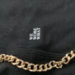 We Wore What  black biker shorts with gold chain belt Photo 4