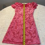  . Velvet Vibrant Pink Dress Size 6. Chic Ivy City Co. dress in vibrant pink. Features elegant floral accents. Ideal for stylish events.. NWT Photo 1
