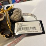 Bebe brand new Crossbody. The dimensions are 7 1/2 inches wide and 6 inches long Photo 7