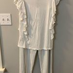 Hale Bob  soft pajamas. Bottoms are offwhite with polka dots w/ a ruffled top. Photo 0