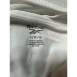 Reebok  Women's White Active Tee Size Large Back Cutout Logo Athleisure Top Photo 4
