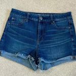 American Eagle  dark wash high rise shortie blue jean shorts in size 10 Photo 0