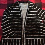 kim rogers Black and white striped cardigan Photo 1