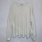 Urban Outfitters UO Cream Textured Oversized V Lillu Sweater Photo 0