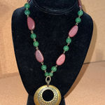 Avon SAQ brass medallion pendant necklace with green and brown beads 18 in VTG Photo 0