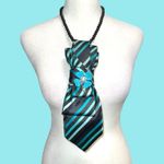 “Dainty Dapper” black necktie necklace with aqua stripes. Aqua flower brooch Photo 2