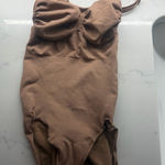 SKIMS  Sculpting Bodysuit Snaps Photo 0