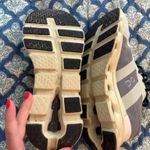 on cloud  grey and green women’s running shoes  Photo 5