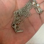 Elegant Silver Infinity Necklace with Pearls from Vantel Pearls Photo 2