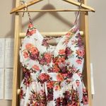 White Romper with a Long Train, Red Flower Prints, and Zipper in the Back Size M Photo 2