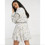 Free People  Flower Fields Mini Dress in Light Combo Size Small Photo 1