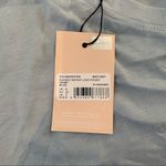 Missguided - Playboy Repeat Logo Pocket Tee in Blue Photo 4