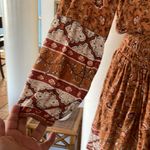 American Eagle  Women's Boho Burnt Orange Floral Smocked Photo 5