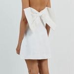 DISSH AISLE WHITE LINEN BACK BOW DRESS Photo 1
