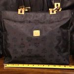 MCM  Black and Gold Monogram Shoulder Bag with Top Zipper Closure Made In Germany Photo 6