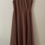 System unbalanced dress. S Brown Photo 0