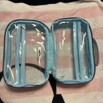 Nicole Miller  cosmetic travel see thru bag with pockets inside great for travel Photo 1