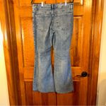 EXPRESS  Mid Rise light wash 70’s Flare Raw hem Size Lg S -NWTS Photo 4