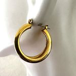 Gold tone double hoop earrings Photo 3