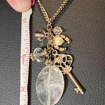 Boutique Elegant Gold Tone Charm Necklace with A Touch of Glamour for Any Occasion Photo 10