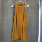 Lulus  Groove Thing golden yellow swing dress with a mock neck and front cutout Photo 1