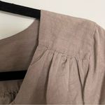 J.Crew linen long sleeve top in taupe
color. Sleeves could be rolled up. Size S Photo 1