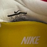 Nike  White and Yellow Athletic Shoes Photo 9