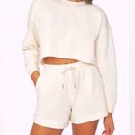 We Wore What  Cropped Crewneck Sweatshirt Photo 0