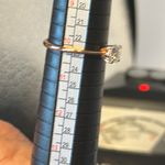 Moissanite 3/4 of a carrot platinum over sterling silver with gold. Size 10 1/4. Photo 2