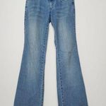 Angel Jeans Strech Embossed wing design with Bling detailing - Rhinestone rivets Photo 0