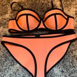 Triangl Bathing Suit Top And Bottom Photo 0