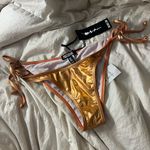 Poster Girl XL orange chrome tie up  swim bottoms Photo 0
