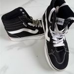 Vans  Classic Black and White High-Tops Photo 8