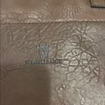 Elegant Brown Leather Tote with Braided Handles Photo 1