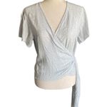 Billabong -PLAID WRAP TOP-SIZE MEDIUM Super cute light blue plaid, wrap top, excellent condition, size medium Measure: Bust: armpit to armpit 19 inches Lengths: shoulder seam to bottom 20 inches Photo 0