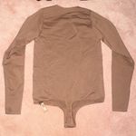 SKIMS  Essential Crew Neck Longsleeve Thong Bodysuit Photo 3