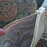 Charming Charlie Blush Metallic Snakeprint Crossbody Wristlet from Photo 3