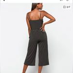 Kaileigh  Chic Black and White Striped Jumpsuit Photo 4