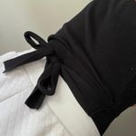 Francesca's Cropped Black Wrap Top Photo 3