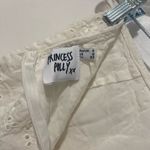 Princess Polly  White Eyelet Ruffle Wrap Mini Skirt | Size 0 Photo 2