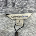 Calvin Klein Jeans NWT Gray Cold Stone Heather Peplum T-shirt Size Large Photo 8