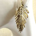 Gold tone palm leaf post earrings Photo 3