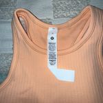 Lululemon NWT  Ebb to Street Cropped Racerback Tank
Size 4
Peach Bellini Photo 2
