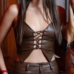 Tiger Mist  brown leather top Photo 0