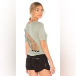 Alo Yoga Entwine Lace Back Short Sleeve Top in Sage Green OS Photo 1
