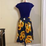 Women’s summer 1950s vintage elegant sunflower floral print. Purple Photo 3